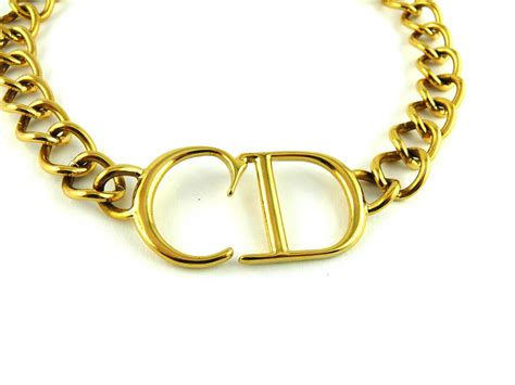 gold dior necklace for women.